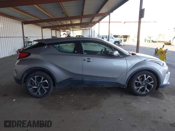 ✅ 2018 Toyota C-HR XLE • VIN: NMTKHMBX4JR041814 • Лот: 43610173. Опубликован ранее на IAAI с пробегом 77 502 миль. Бесплатный доступ к архиву аукционных продаж из США и подробный отчёт об истории автомобиля на DreamBid. Изображение 13.