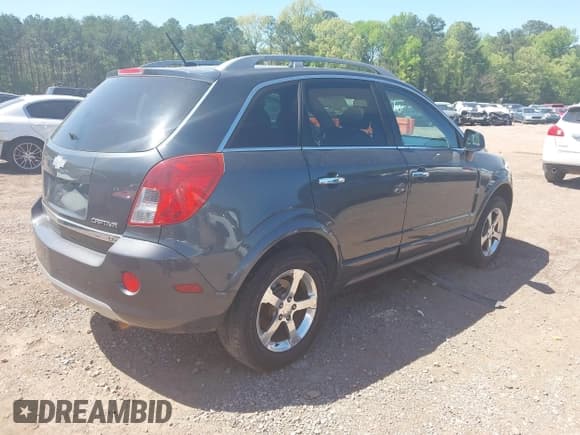 ✅ 2013 Chevrolet Captiva Sport LT • VIN: 3GNAL3EK4DS579698 • Lot: 41972058. Wystawiony na IAAI z przebiegiem 169 447 mil. Bezpłatny archiwum sprzedaży aukcyjnych z USA i szczegółowy raport historii pojazdu na DreamBid. Zdjęcie 4.