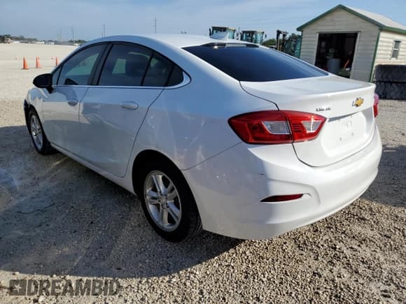✅ 2018 Chevrolet Cruze LT • VIN: 1G1BE5SM8J7154190 • Lot: 67681662. Listed on Copart with 102,005 mi. Free auction sales archive from the USA and detailed vehicle history report at DreamBid. Image 2.
