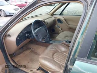 ✅ 1995 Pontiac Bonneville SE • VIN: 1G2HX52K2S4261981 • Lot: 41876283. Wystawiony na IAAI z przebiegiem 122 052 mil. Bezpłatny archiwum sprzedaży aukcyjnych z USA i szczegółowy raport historii pojazdu na DreamBid. Zdjęcie 6.