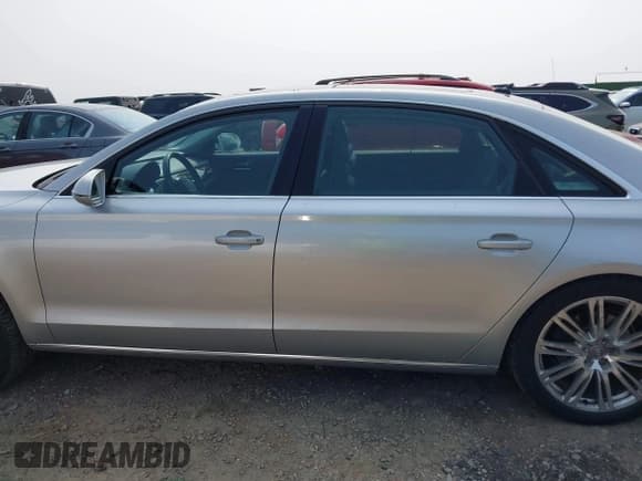✅ 2013 Audi A8 3.0L • VIN: WAURGAFD9DN007120 • Lot: 42384512. Listed on IAAI with 195,319 mi. Free auction sales archive from the USA and detailed vehicle history report at DreamBid. Image 14.