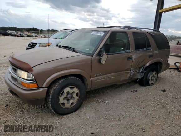 2002 Chevrolet Blazer LS z VIN 1GNDT13W42K216527, wystawiony jako Copart lot #78736754 z przebiegiem 212 774 mil mil oraz Szkoda całkowita • Salvage title. Historia ofert i sprzedaży dostępna na DreamBid. Obrazek 1.