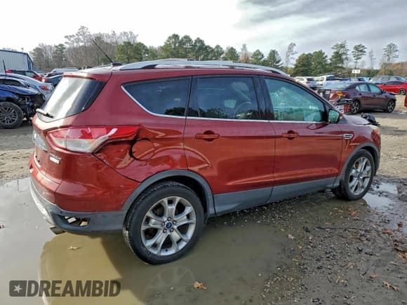 ✅ 2015 Ford Escape Titanium • VIN: 1FMCU0JX0FUA50956 • Lot: 94133575. Listed on Copart with 106,503 mi. Free auction sales archive from the USA and detailed vehicle history report at DreamBid. Image 3.