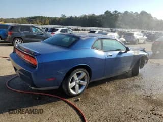 ✅ 2009 Dodge Challenger R/T • VIN: 2B3LJ54T79H509847 • Lot: 77759664. Wystawiony na Copart z przebiegiem 124 475 mil. Bezpłatny archiwum sprzedaży aukcyjnych z USA i szczegółowy raport historii pojazdu na DreamBid. Zdjęcie 3.