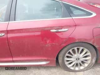 2015 Hyundai Sonata Limited z VIN 5NPE34AF8FH015008, wystawiony jako IAAI lot #42699857 z przebiegiem 123 116 mil mil oraz . Historia ofert i sprzedaży dostępna na DreamBid. Obrazek 6.