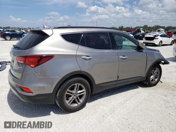 ✅ 2017 Hyundai Santa Fe 2.4L • VIN: 5XYZU3LB4HG381139 • Лот: 46421443. Опубликован ранее на Copart с пробегом 73 306 миль. Бесплатный доступ к архиву аукционных продаж из США и подробный отчёт об истории автомобиля на DreamBid. Изображение 3.