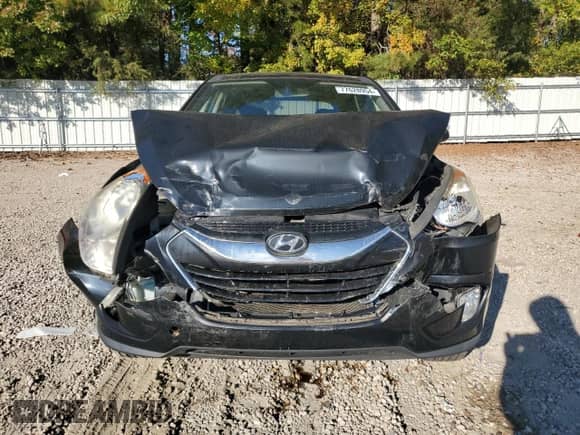 2011 Hyundai Tucson GLS z VIN KM8JU3AC0BU142391, wystawiony jako Copart lot #77628954 z przebiegiem 117 081 mil mil oraz Szkoda całkowita • Salvage title. Historia ofert i sprzedaży dostępna na DreamBid. Obrazek 5.