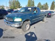✅ 1997 Ford F-150 XL • VIN: 1FTDX1861VKA99001 • Lot: 43214637. Listed on IAAI with 201,282 mi. Free auction sales archive from the USA and detailed vehicle history report at DreamBid. Image 2.