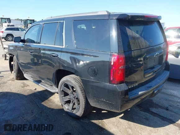 2018 Chevrolet Tahoe LT z VIN 1GNSKBKC8JR128657, wystawiony jako IAAI lot #43151589 z przebiegiem 157 909 mil mil oraz . Historia ofert i sprzedaży dostępna na DreamBid. Obrazek 3.