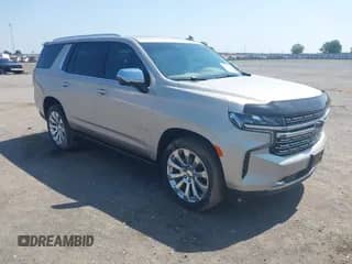 2023 Chevrolet Tahoe Premier z VIN 1GNSKSKD2PR109782, wystawiony jako IAAI lot #42473138 z przebiegiem 42 179 mil mil oraz . Historia ofert i sprzedaży dostępna na DreamBid. Obrazek 1.