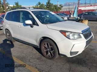 2014 Subaru Forester XT Premium with VIN JF2SJGDC2EH552807, listed as a IAAI auction lot 43486709 with 154,534 mi miles and . Bid and sale history available at DreamBid. Image 1.
