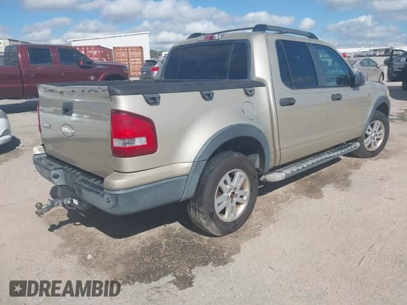 ✅ 2007 Ford Explorer Sport Trac XLT • VIN: 1FMEU31857UB24134 • Lot: 43455608. Listed on IAAI with 191,922 mi. Free auction sales archive from the USA and detailed vehicle history report at DreamBid. Image 4.