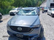 ✅ 2021 Mazda CX-5 Carbon Edition • VIN: JM3KFBCY3M0376581 • Лот: 42739625. Опубликован ранее на IAAI с пробегом 27 663 миль. Бесплатный доступ к архиву аукционных продаж из США и подробный отчёт об истории автомобиля на DreamBid. Изображение 11.