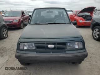 ✅ 1994 Geo Tracker • VIN: 2CNBE18U1R6918878 • Lot: 75894834. Wystawiony na Copart z przebiegiem Nie podano. Bezpłatny archiwum sprzedaży aukcyjnych z USA i szczegółowy raport historii pojazdu na DreamBid. Zdjęcie 5.