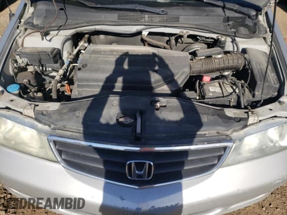 ✅ 2004 Honda Odyssey EX-L • VIN: 2HKRL18944H004598 • Lot: 73196314. Listed on Copart with 259,652 mi. Free auction sales archive from the USA and detailed vehicle history report at DreamBid. Image 12.