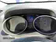 2014 Hyundai Tucson Walking Dead Edition with VIN KM8JUCAG8EU936627, listed as a Copart auction lot 56313984 with 109,412 mi miles and Salvage title. Bid and sale history available at DreamBid. Image 9.