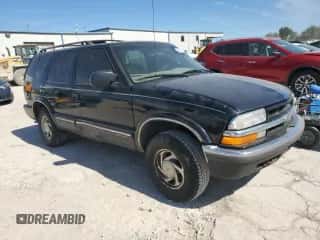 2001 Chevrolet Blazer LT z VIN 1GNDT13W812221860, wystawiony jako Copart lot #74085514 z przebiegiem Nie podano mil oraz Szkoda całkowita • Salvage title. Historia ofert i sprzedaży dostępna na DreamBid. Obrazek 4.