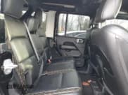 ✅ 2021 Jeep Wrangler Unlimited Sahara Altitude • VIN: 1C4HJXEM9MW815157 • Lot: 90547485. Listed on Copart with 71,496 mi. Free auction sales archive from the USA and detailed vehicle history report at DreamBid. Image 11.