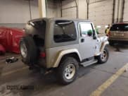 ✅ 2004 Jeep Wrangler Sahara • VIN: 1J4FA59S04P747727 • Lot: 43599384. Listed on IAAI with 190,912 mi. Free auction sales archive from the USA and detailed vehicle history report at DreamBid. Image 4.