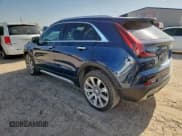 ✅ 2022 Cadillac XT4 AWD Premium Luxury • VIN: 1GYFZDR4XNF153562 • Лот: 61836005. Опубликован ранее на Copart с пробегом 33 091 миль. Бесплатный доступ к архиву аукционных продаж из США и подробный отчёт об истории автомобиля на DreamBid. Изображение 2.