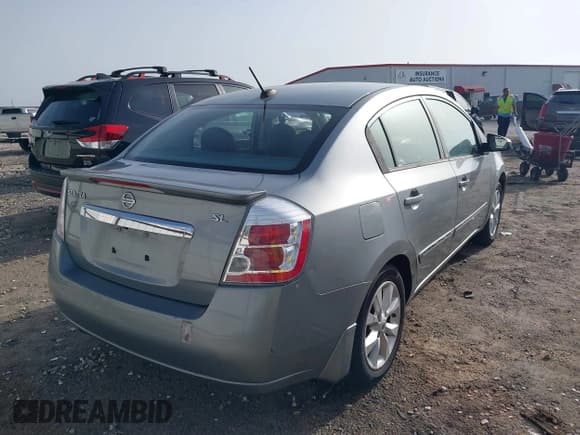 ✅ 2011 Nissan Sentra SL • VIN: 3N1AB6APXBL620456 • Lot: 42231832. Listed on IAAI with 124,430 mi. Free auction sales archive from the USA and detailed vehicle history report at DreamBid. Image 4.