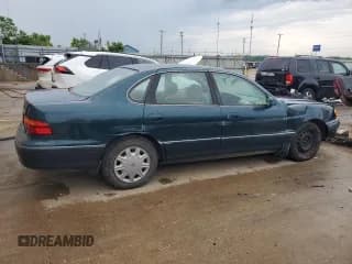 ✅ 1998 Toyota Avalon XL • VIN: 4T1BF18B1WU243770 • Лот: 57039794. Опубликован ранее на Copart с пробегом 131 478 миль. Бесплатный доступ к архиву аукционных продаж из США и подробный отчёт об истории автомобиля на DreamBid. Изображение 3.