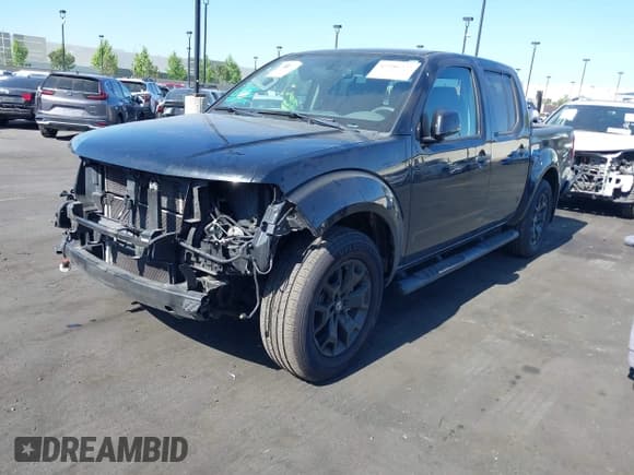 ✅ 2021 Nissan Frontier SV • VIN: 1N6ED0EA7MN702186 • Lot: 42286772. Listed on IAAI with 70,393 mi. Free auction sales archive from the USA and detailed vehicle history report at DreamBid. Image 19.
