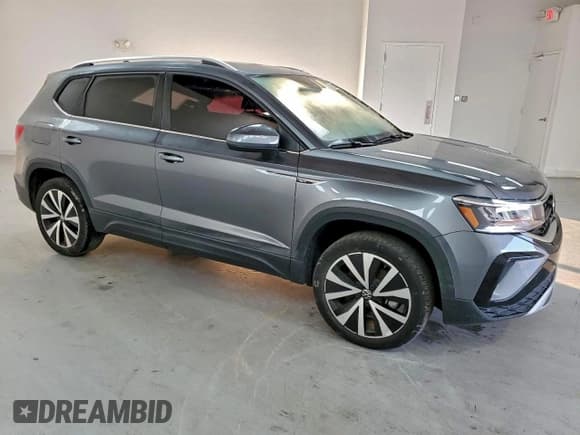 ✅ 2024 Volkswagen Taos SE • VIN: 3VVSX7B20RM026363 • Лот: 93878475. Опубликован ранее на Copart с пробегом 34 251 миль. Бесплатный доступ к архиву аукционных продаж из США и подробный отчёт об истории автомобиля на DreamBid. Изображение 4.