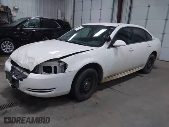 2009 Chevrolet Impala Police Police z VIN 2G1WS57M491315291, wystawiony jako IAAI lot #41877060 z przebiegiem 184 460 mil mil oraz . Historia ofert i sprzedaży dostępna na DreamBid. Obrazek 2.