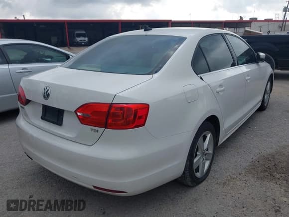 ✅ 2014 Volkswagen Jetta TDI • VIN: 3VW3L7AJ8EM352748 • Lot: 43552865. Listed on IAAI with 224,823 mi. Free auction sales archive from the USA and detailed vehicle history report at DreamBid. Image 4.