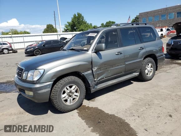 ✅ 1998 Lexus LX 470 • VIN: JT6HT00W1W0024161 • Lot: 65483484. Listed on Copart with 180,853 mi. Free auction sales archive from the USA and detailed vehicle history report at DreamBid. Image 1.