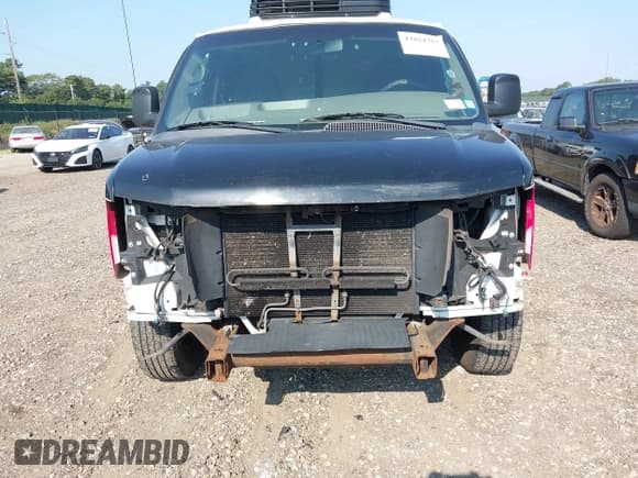 ✅ 2014 GMC Savana • VIN: 1GTZ7UFG6E1134785 • Lot: 42824757. Listed on IAAI with 148,851 mi. Free auction sales archive from the USA and detailed vehicle history report at DreamBid. Image 12.