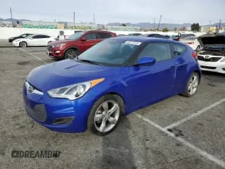 ✅ 2013 Hyundai Veloster w/Gray Int • VIN: KMHTC6AD9DU142088 • Lot: 83217374. Wystawiony na Copart z przebiegiem 83 328 mil. Bezpłatny archiwum sprzedaży aukcyjnych z USA i szczegółowy raport historii pojazdu na DreamBid. Zdjęcie 1.