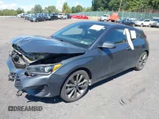 2020 Hyundai Veloster 2.0 z VIN KMHTG6AF2LU031533, wystawiony jako IAAI lot #43095745 z przebiegiem 55 828 mil mil oraz . Historia ofert i sprzedaży dostępna na DreamBid. Obrazek 2.