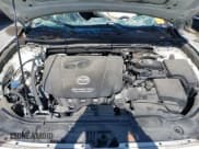 ✅ 2014 Mazda 3 i Touring • VIN: JM1BM1L76E1100259 • Лот: 42322810. Опубликован ранее на IAAI с пробегом Не указан. Бесплатный доступ к архиву аукционных продаж из США и подробный отчёт об истории автомобиля на DreamBid. Изображение 10.