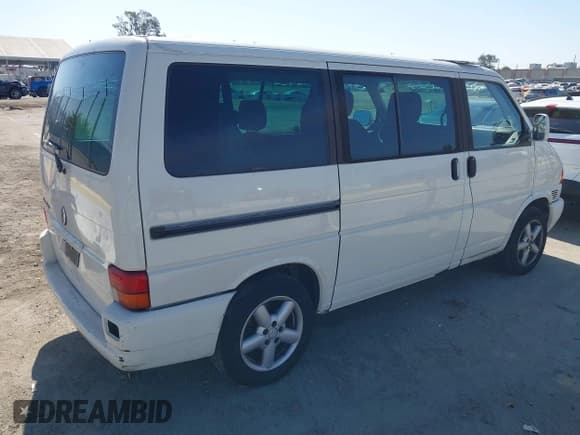 ✅ 2002 Volkswagen EuroVan GLS • VIN: WV2KB47042H047408 • Lot: 42007062. Listed on IAAI with 131,971 mi. Free auction sales archive from the USA and detailed vehicle history report at DreamBid. Image 4.