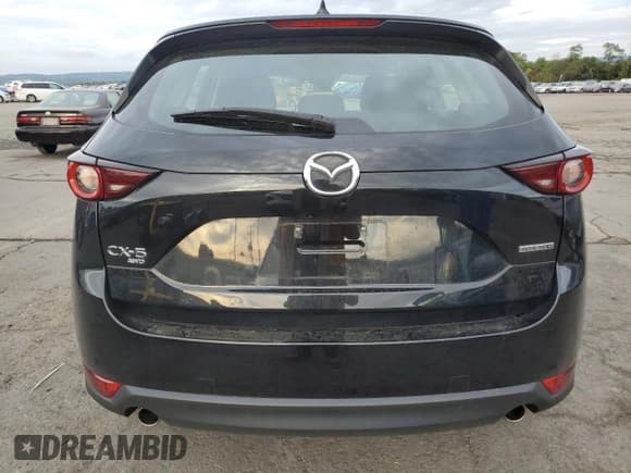 ✅ 2021 Mazda CX-5 Sport • VIN: JM3KFBBM7M0350581 • Лот: 80955655. Опубликован ранее на Copart с пробегом 56 344 миль. Бесплатный доступ к архиву аукционных продаж из США и подробный отчёт об истории автомобиля на DreamBid. Изображение 6.