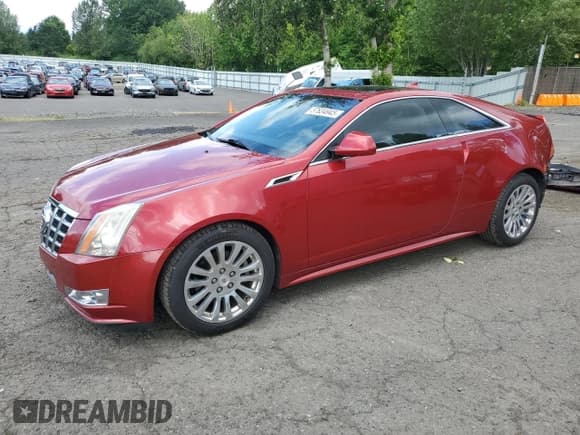 ✅ 2013 Cadillac CTS Performance • VIN: 1G6DJ1E39D0121061 • Lot: 57634945. Listed on Copart with 106,583 mi. Free auction sales archive from the USA and detailed vehicle history report at DreamBid. Image 1.