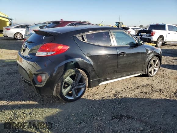 ✅ 2014 Hyundai Veloster Turbo • VIN: KMHTC6AE9EU199062 • Lot: 89151635. Wystawiony na Copart z przebiegiem 100 606 mil. Bezpłatny archiwum sprzedaży aukcyjnych z USA i szczegółowy raport historii pojazdu na DreamBid. Zdjęcie 3.