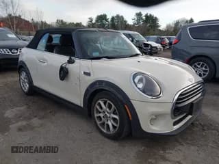 ✅ 2019 MINI Convertible Cooper • VIN: WMWWG5C51K3H07720 • Lot: 43660610. Listed on IAAI with 52,494 mi. Free auction sales archive from the USA and detailed vehicle history report at DreamBid. Image 1.