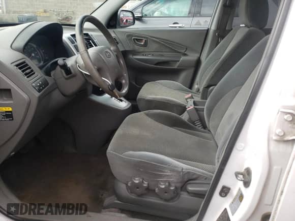 2007 Hyundai Tucson SE z VIN KM8JN72D27U569221, wystawiony jako Copart lot #74250944 z przebiegiem 195 097 mil mil oraz Szkoda całkowita • Salvage title. Historia ofert i sprzedaży dostępna na DreamBid. Obrazek 7.