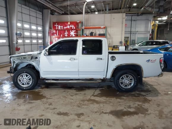 ✅ 2012 GMC Canyon SLE1 • VIN: 1GTH6MFE8C8105337 • Lot: 41592351. Listed on IAAI with 179,147 mi. Free auction sales archive from the USA and detailed vehicle history report at DreamBid. Image 15.