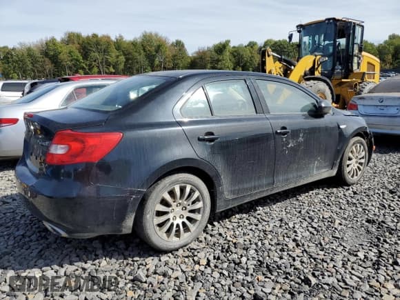 ✅ 2010 Suzuki Kizashi SE • VIN: JS2RE9A36A6100825 • Lot: 83776115. Listed on Copart with 153,435 mi. Free auction sales archive from the USA and detailed vehicle history report at DreamBid. Image 3.