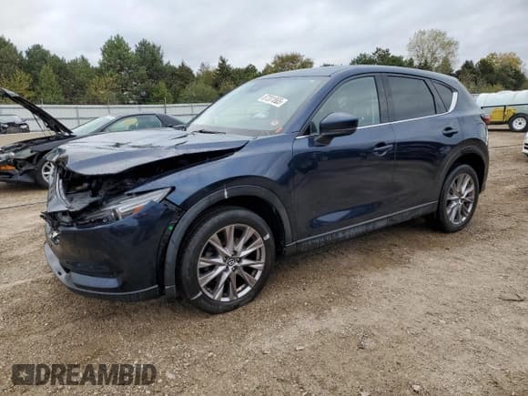 ✅ 2019 Mazda CX-5 Grand Touring Reserve • VIN: JM3KFBDY5K0623563 • Лот: 87201865. Опубликован ранее на Copart с пробегом 46 313 миль. Бесплатный доступ к архиву аукционных продаж из США и подробный отчёт об истории автомобиля на DreamBid. Изображение 1.
