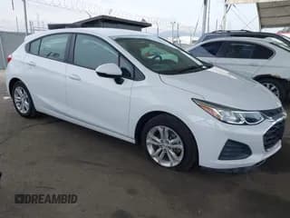 ✅ 2019 Chevrolet Cruze LS • VIN: 3G1BC6SM1KS546877 • Lot: 43100765. Listed on IAAI with 54,667 mi. Free auction sales archive from the USA and detailed vehicle history report at DreamBid. Image 1.