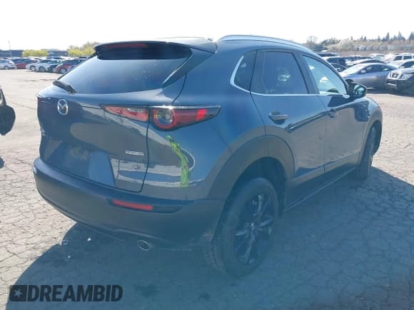 ✅ 2023 Mazda CX-30 S Carbon Edition • VIN: 3MVDMBCM1PM557862 • Lot: 41966734. Listed on IAAI with 36,757 mi. Free auction sales archive from the USA and detailed vehicle history report at DreamBid. Image 4.