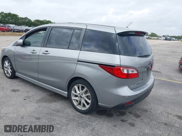 ✅ 2013 Mazda 5 Touring • VIN: JM1CW2CL5D0160104 • Lot: 41722470. Listed on IAAI with 135,708 mi. Free auction sales archive from the USA and detailed vehicle history report at DreamBid. Image 3.