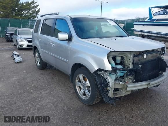 ✅ 2013 Honda Pilot EX-L • VIN: 5FNYF3H76DB013332 • Lot: 41193240. Listed on IAAI with 121,308 mi. Free auction sales archive from the USA and detailed vehicle history report at DreamBid. Image 1.