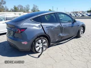 ✅ 2023 Tesla Model Y Long Range • VIN: 7SAYGDEE8PA122529 • Lot: 43101493. Listed on IAAI with 29,770 mi. Free auction sales archive from the USA and detailed vehicle history report at DreamBid. Image 4.