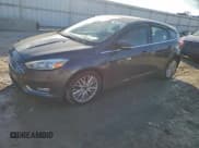 ✅ 2017 Ford Focus Titanium • VIN: 1FADP3N22HL342591 • Lot: 96624285. Listed on Copart with 117,405 mi. Free auction sales archive from the USA and detailed vehicle history report at DreamBid. Image 1.